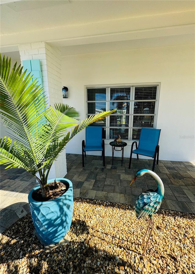 view of patio / terrace with an outdoor fire pit