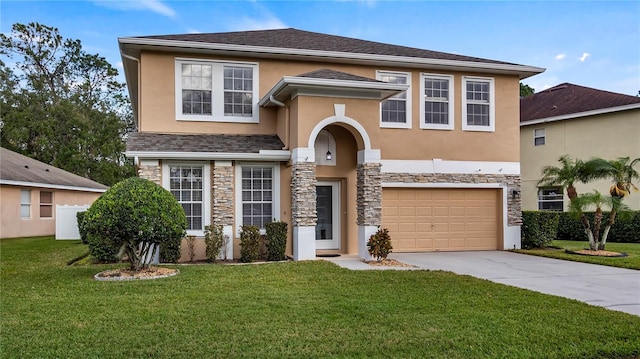 traditional-style house featuring stucco siding, driveway, stone siding, a front yard, and a garage