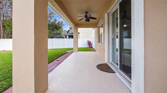 view of patio with a ceiling fan and a fenced backyard