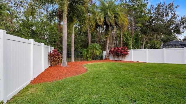 view of yard featuring a fenced backyard