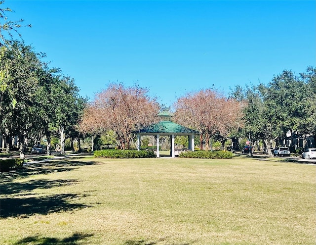 view of home's community featuring a gazebo and a yard