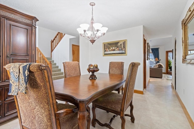 dining room with a chandelier