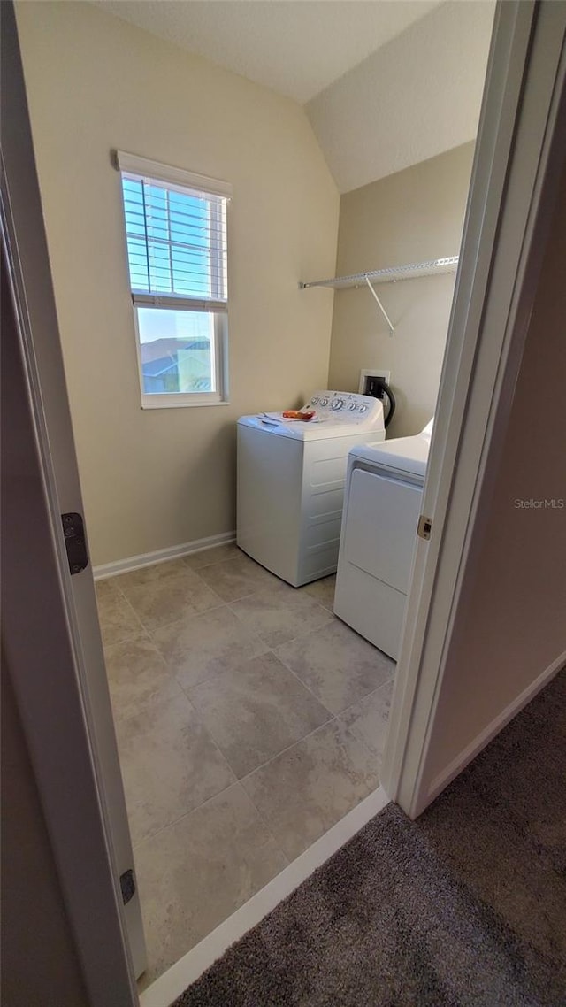 laundry room featuring separate washer and dryer