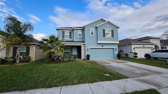 view of front of property with a garage and a front lawn