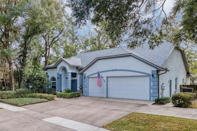 ranch-style home with a garage