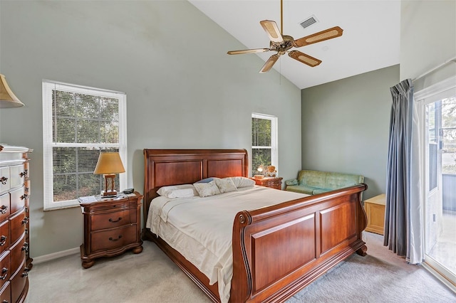 bedroom with ceiling fan, high vaulted ceiling, and light colored carpet