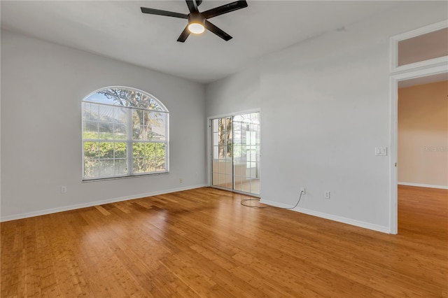 spare room featuring ceiling fan and light hardwood / wood-style flooring