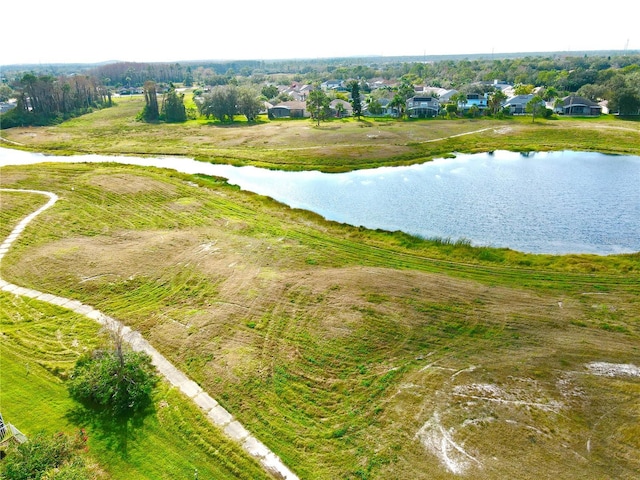 drone / aerial view featuring a water view and a rural view