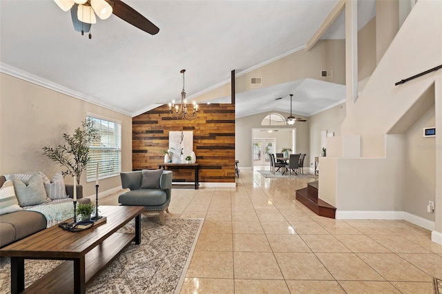 living room featuring ornamental molding, ceiling fan with notable chandelier, wooden walls, light tile patterned floors, and lofted ceiling