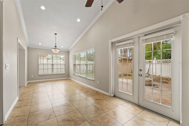 doorway to outside featuring french doors, vaulted ceiling, ceiling fan, ornamental molding, and light tile patterned floors