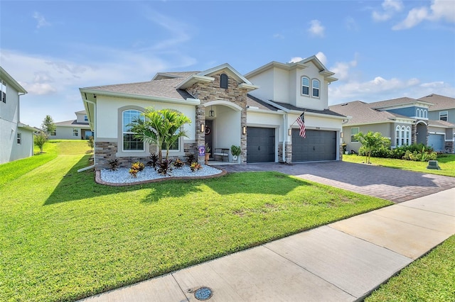 view of front of house featuring a front yard and a garage