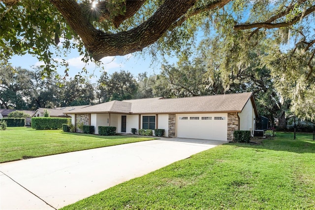 single story home featuring central AC unit, a garage, and a front lawn