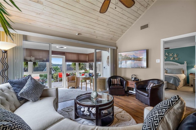 living room with hardwood / wood-style floors, wood ceiling, high vaulted ceiling, and ceiling fan