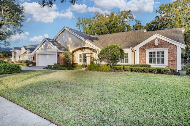 single story home with a garage and a front yard