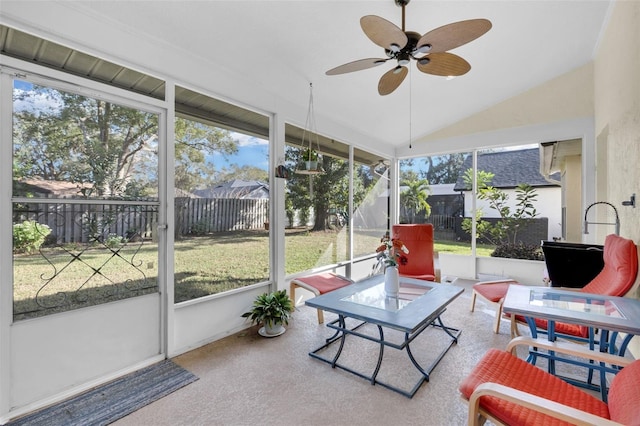 sunroom featuring ceiling fan and lofted ceiling