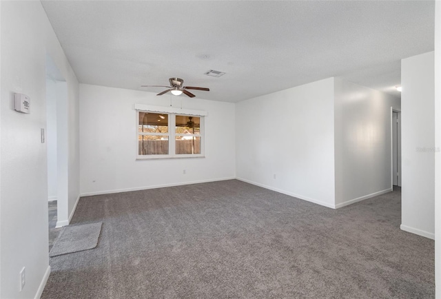 carpeted empty room with ceiling fan