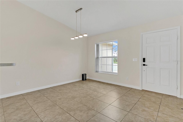 unfurnished dining area featuring light tile patterned flooring