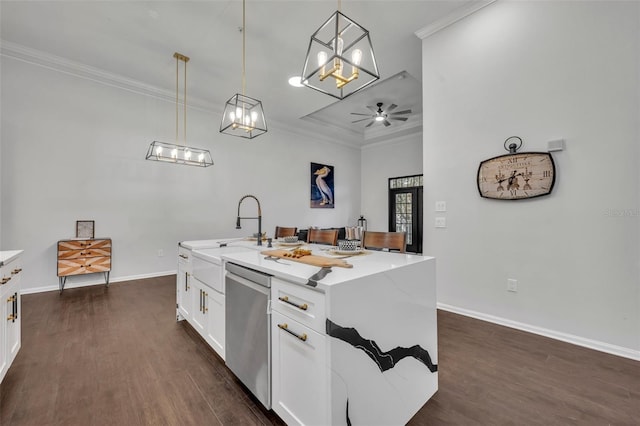 kitchen with sink, dishwasher, hanging light fixtures, white cabinets, and a center island with sink