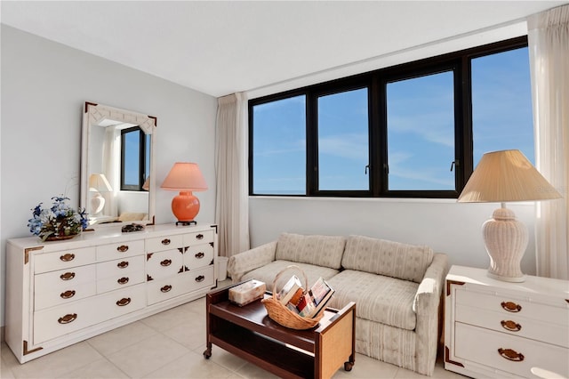 tiled living room with a healthy amount of sunlight