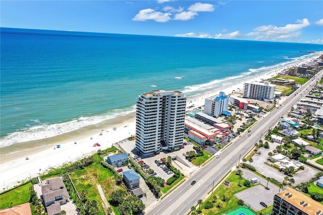 drone / aerial view with a view of the beach and a water view