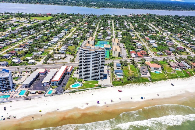 aerial view featuring a water view and a beach view