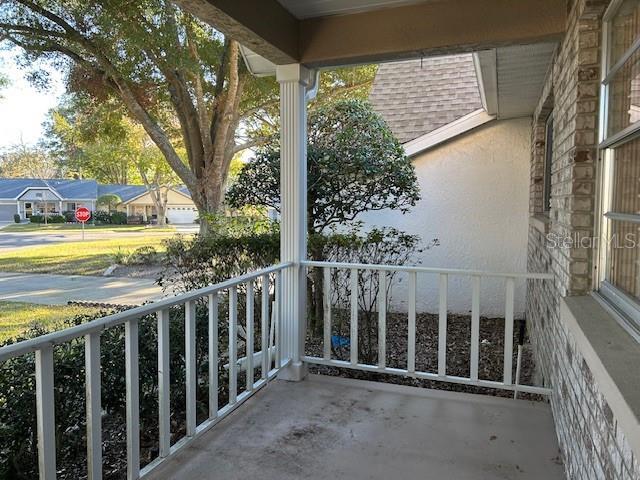 balcony featuring a porch