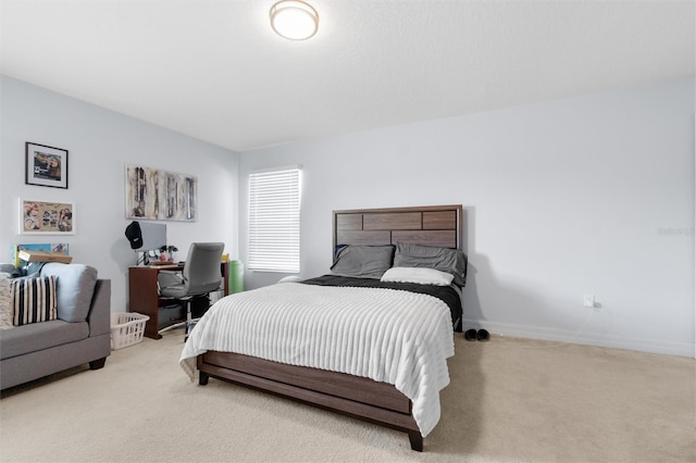 bedroom with light carpet