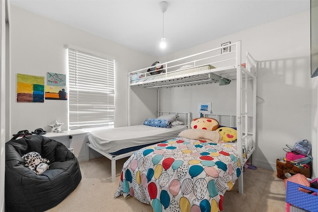 bedroom featuring carpet