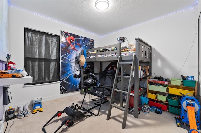 carpeted bedroom featuring a textured ceiling