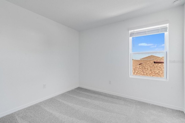 empty room featuring carpet