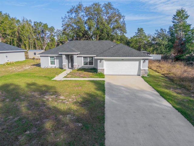 ranch-style home with a front yard and a garage