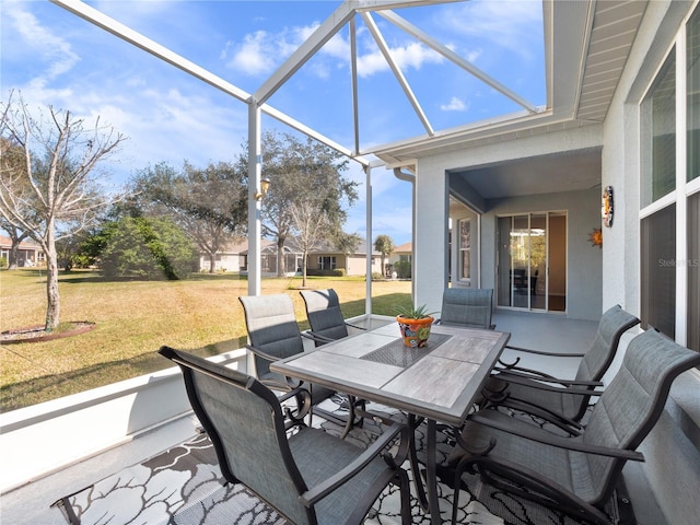 view of patio / terrace with glass enclosure