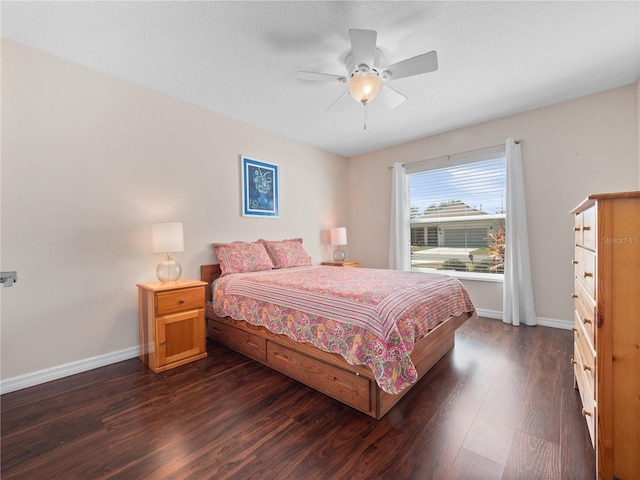 bedroom featuring dark hardwood / wood-style floors and ceiling fan