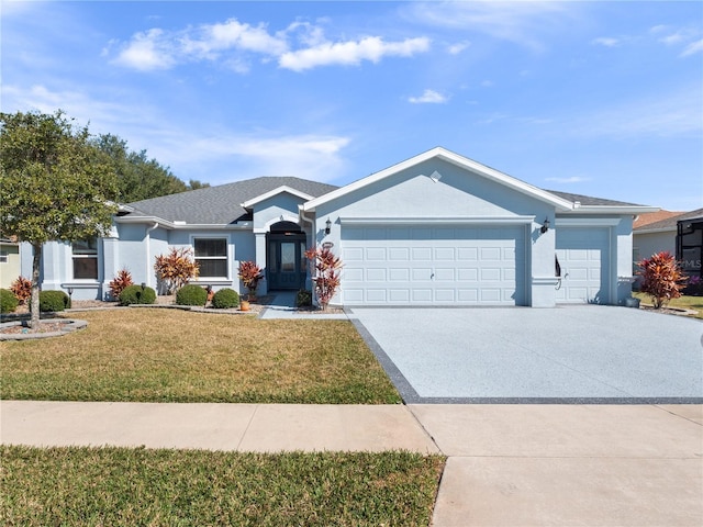 single story home featuring a garage and a front yard