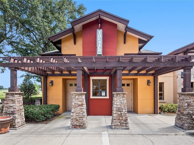 view of front of home with a pergola