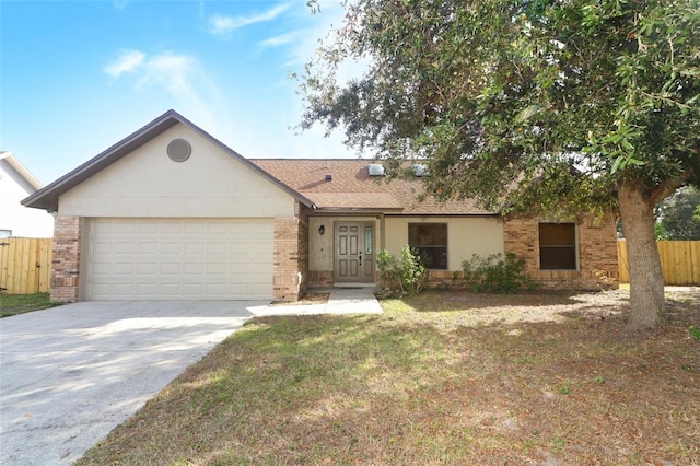 single story home with a garage