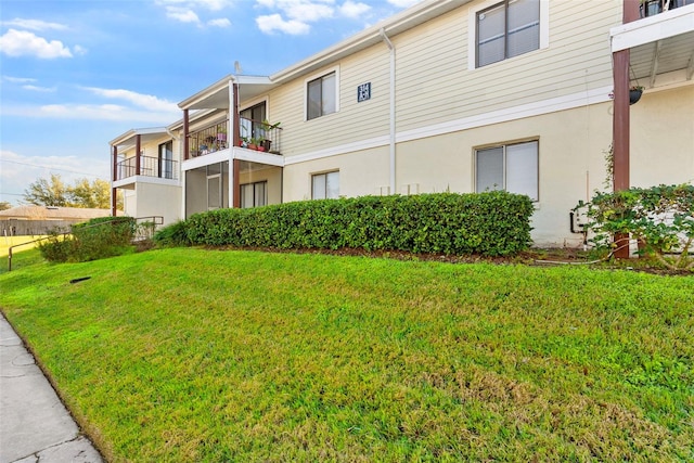 exterior space with a yard