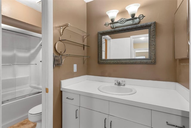 full bathroom with shower / bath combination with glass door, vanity, and toilet