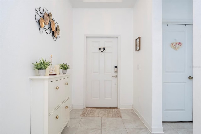 interior space with light tile patterned floors