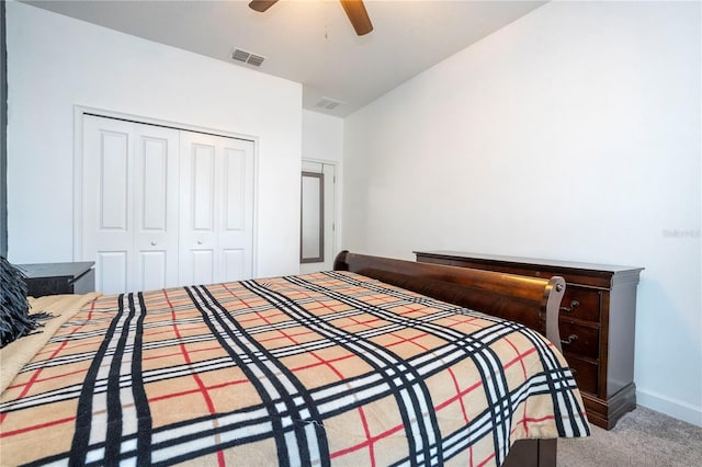 carpeted bedroom featuring ceiling fan and a closet