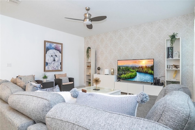 living room featuring ceiling fan