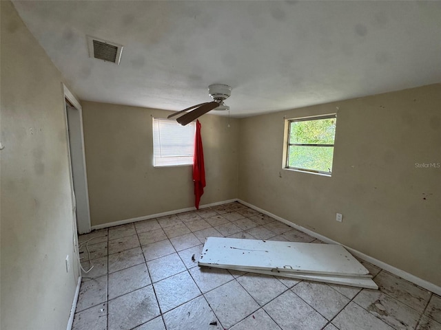 empty room with ceiling fan