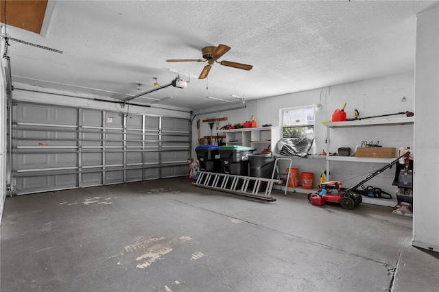 garage featuring a garage door opener and ceiling fan