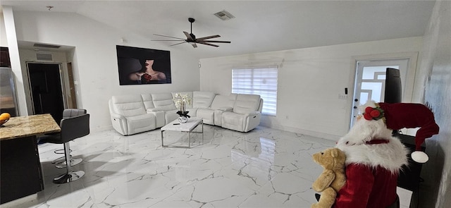 living area featuring visible vents, baseboards, ceiling fan, lofted ceiling, and marble finish floor