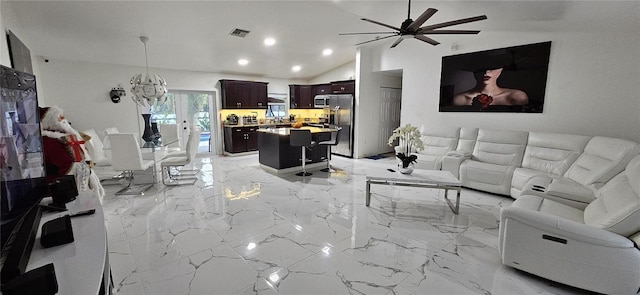 living room with visible vents, ceiling fan, lofted ceiling, recessed lighting, and marble finish floor