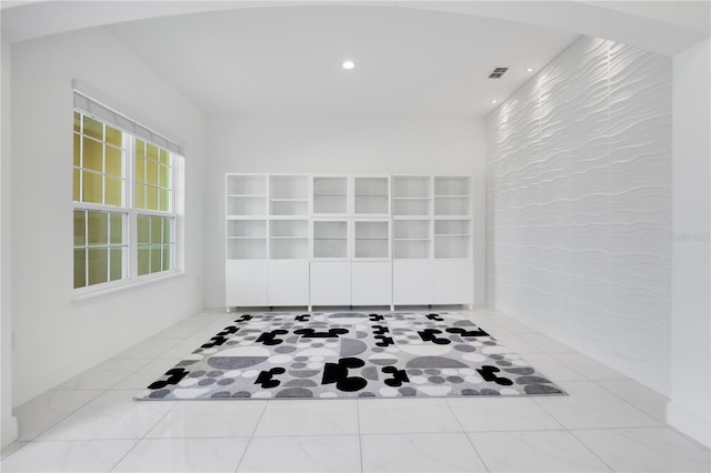 interior space featuring light tile patterned floors