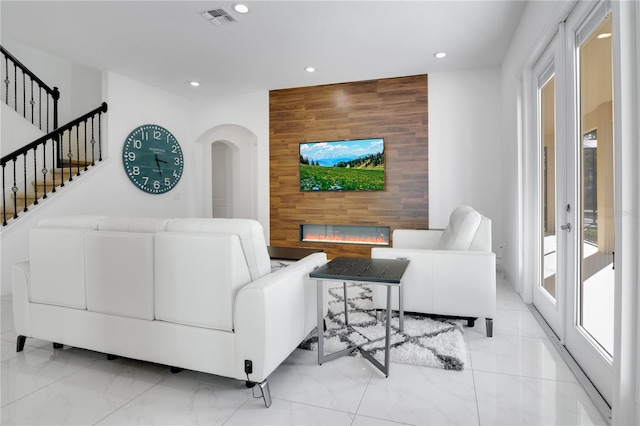 living room featuring wooden walls