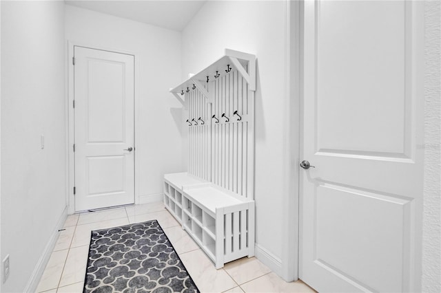 mudroom with light tile patterned floors