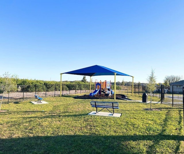 view of jungle gym featuring a yard