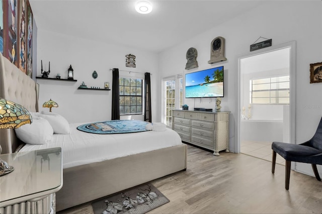 bedroom featuring light hardwood / wood-style floors